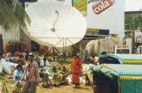 market in front of large satellite dish, galoa vita levu fiji